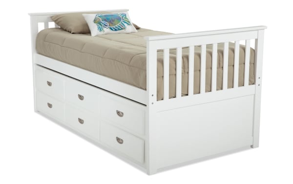 Chadwick Twin White Storage Captain Bed with Twin Trundle in transitional style, made of MDF, poplar solids, and veneers, featuring built-in drawers and slatted headboard and footboard.