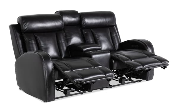 Tuxedo Black 73" power reclining console loveseat in black faux leather with power headrests, USB ports, and hidden storage, contemporary style.