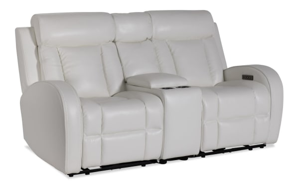 Tuxedo White 73'' power reclining console loveseat in white faux leather with power headrests, USB ports, cup holders, and hidden storage.
