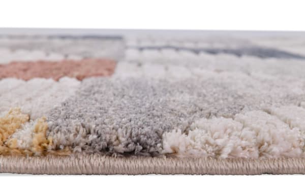 Margot 9' x 12' multi geometric rug with 1-inch thick plush polyester pile, featuring warm earth tones and contemporary multicolored design.