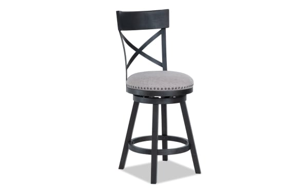 Transitional Iris Dining charcoal gray cross back swivel stool with adjustable height, polyester fabric seat, nailhead trim, and rubberwood frame