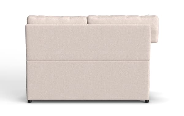 Beige fabric sectional sofa with a modern design, featuring clean lines and low black legs, ideal for contemporary living rooms.