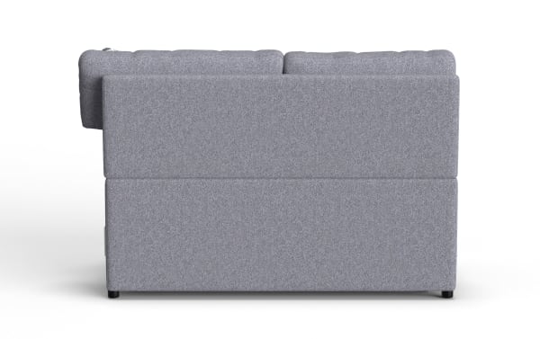 Gray fabric sectional sofa with a modern design, featuring cushioned backrests and compact black legs, ideal for contemporary living rooms.
