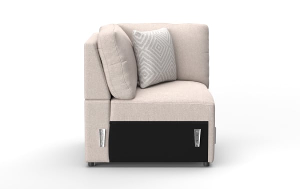 Beige fabric corner sofa section with two matching cushions, featuring metal bracket connectors and short black legs, modern modular design.