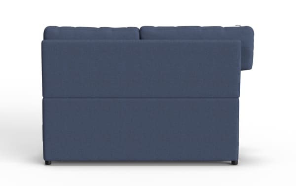 Modern navy blue fabric sectional sofa viewed from the back, featuring clean lines, cushioned backrest, and black cylindrical legs.