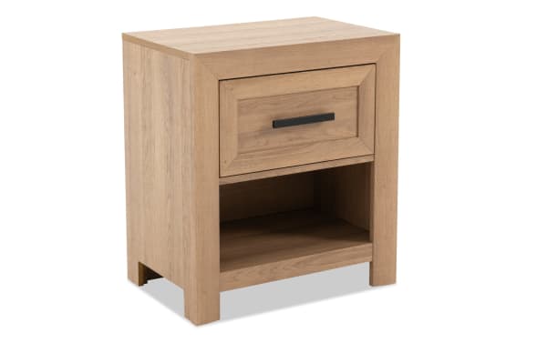 Calvin Light Brown Nightstand with Drawer from Calvin Bedroom collection, featuring transitional style, MDF and engineered wood grain, plank aesthetic, felt-lined drawer, and open storage shelf.