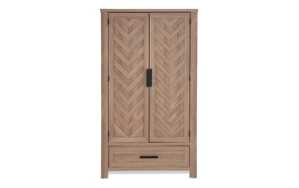 Calvin Light Brown 2 Drawer Armoire from Calvin Bedroom collection, transitional style with MDF, Acacia veneers, chevron door design, natural wood grain, black handles, adjustable clothing rod, and moveable shelves.