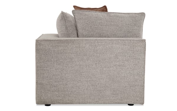 Gray Infinity Gray Corner sectional side view showing transitional style fabric upholstery, polyester and feather pillows, and sturdy wood frame.