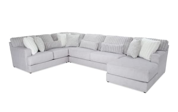 Sofia Gray 159" 4-piece right arm facing chaise sectional in gray polyester fabric with channel tufted back cushions, nine faux fur pillows, and Bob-O-Pedic gel memory foam for transitional style comfort.