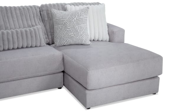 Sofia Gray 159'' 4 Piece Right Arm Facing Chaise Sectional in gray polyester fabric, transitional style with channel tufted back cushions and plush faux fur pillows for luxury and comfort.