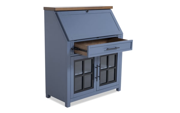 Modern Farm Blue & Brown Drop Lid Desk with Drawer in wood, featuring a blue drop-down top, deep drawer, and glass-front cabinet doors from the Modern Farm Entertainment collection.