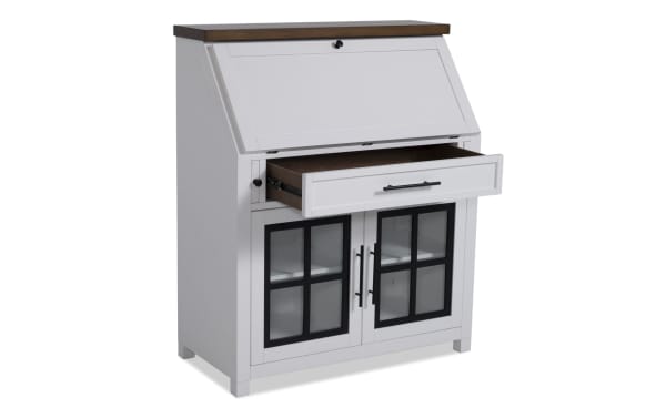 Modern Farm White & Brown Drop Lid Desk with Drawer in transitional style, wood construction, featuring drop-down top, deep drawer, and glass-front cabinet.