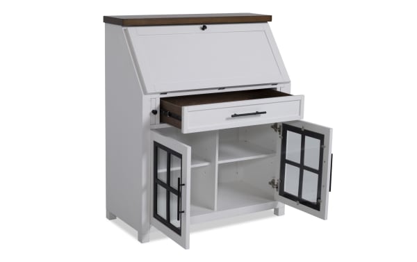 Modern Farm white and brown wood drop lid desk with drawer, glass-front cabinet doors, and built-in USB ports, transitional style.