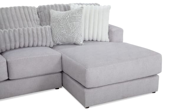 Sofia Gray 98'' 2 Piece Right Arm Facing Chaise Sectional in gray polyester fabric with channel tufted cushions, plush faux fur pillows, and gel memory foam for transitional style comfort.