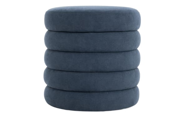 Contemporary Blair Navy Storage Ottoman in blue polyester and nylon fabric, featuring a plush, rounded stacked cushion design for seating or storage.