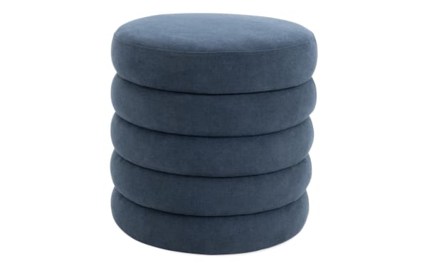 Blair Navy Storage Ottoman in contemporary style with navy blue polyester and nylon fabric upholstery, featuring a plush, stacked cushion design.