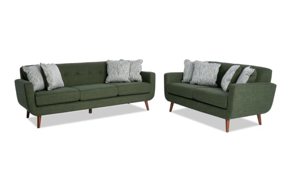 Bettie Avocado 86'' Sofa & 65'' Loveseat set in mid-century modern style with avocado green 100% polyester fabric, tufted seat backs, track arms, wooden legs, and patterned accent pillows.