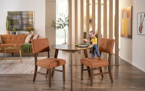 Compact Bettie 3 Piece Walnut & Russet Upholstered Triangle Dining Set with mid-century modern style, button tufting, flared legs, and polyester fabric seats.