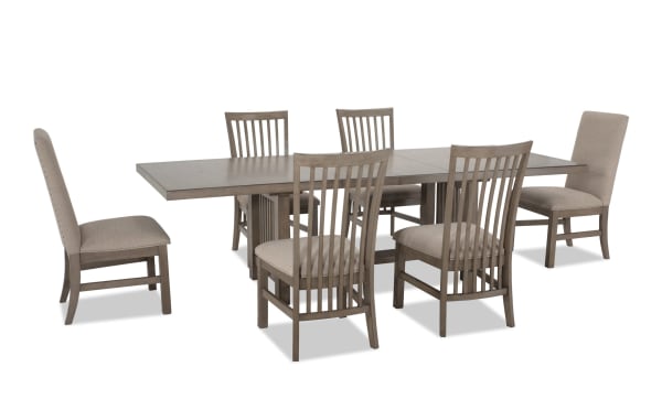 Artisan 7 Piece Gray Upholstered Extendable Dining Set with beige polyester fabric chairs, oak veneer table, and two 14" leaves, transitional style.