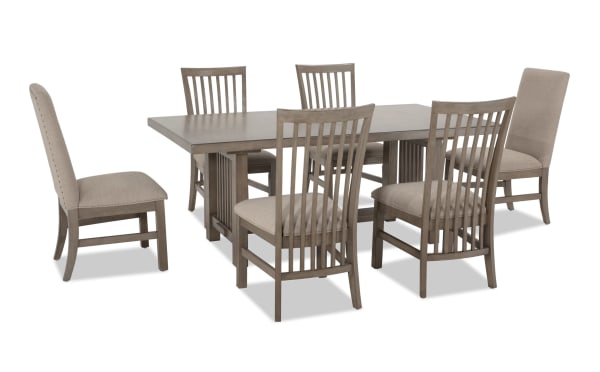 Artisan 9 Piece Gray Upholstered Extendable Dining Set with beige polyester fabric seats, oak veneer table, and two 14" leaves, transitional style.