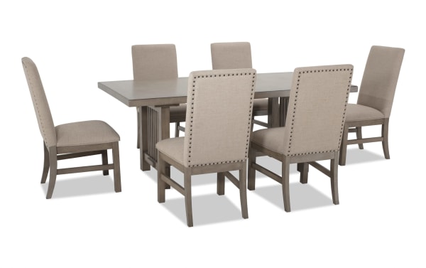 Artisan 7 Piece Gray Upholstered Extendable Dining Set with beige polyester fabric chairs, oak veneer table, and two 14" leaves, transitional style.