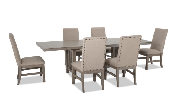 Artisan 7 Piece Gray Upholstered Extendable Dining Set with beige polyester fabric chairs, oak veneer table, and two 14" leaves, transitional style.