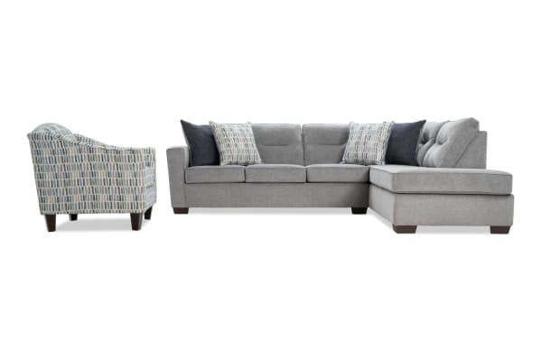 Dylan Slate 112'' 2-piece right arm facing chaise sectional with matching accent chair in gray polyester fabric. Transitional style with memory foam cushions and four patterned pillows.