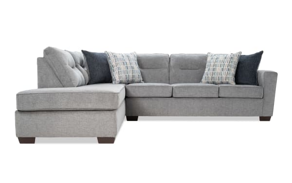 Dylan Slate 112" 2-piece left arm facing sleeper chaise sectional in gray polyester fabric with transitional style, includes four accent pillows and queen gel memory foam mattress.