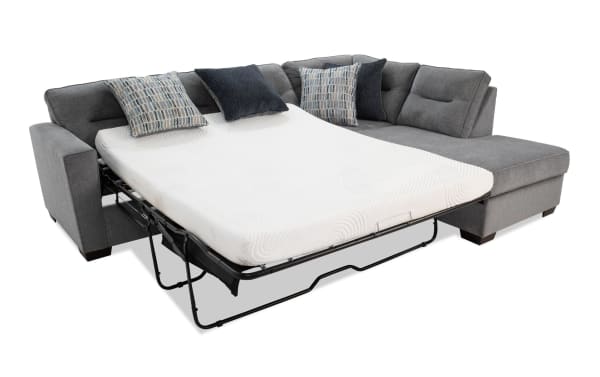 Dylan Slate 112" 2-piece right arm facing sleeper chaise sectional in gray polyester fabric, transitional style, with queen gel memory foam mattress and four accent pillows.