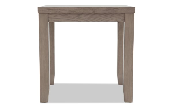 Rectangular wooden table with a natural gray finish, straight legs, and a simple, modern design suitable for dining or office use.