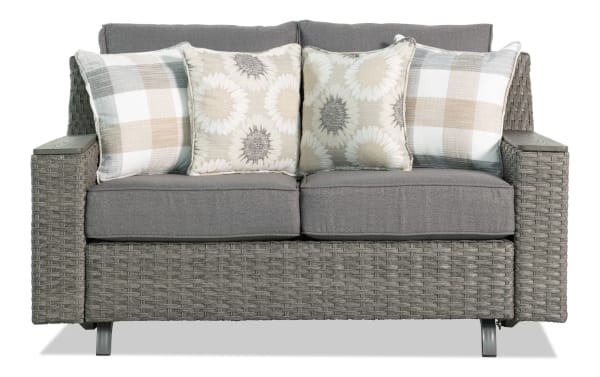 Cottage Chic Gray Wicker Outdoor Gliding Loveseat with weather-resistant gray polyester cushions, all-weather wicker frame, and powder-coated metal legs in transitional style.