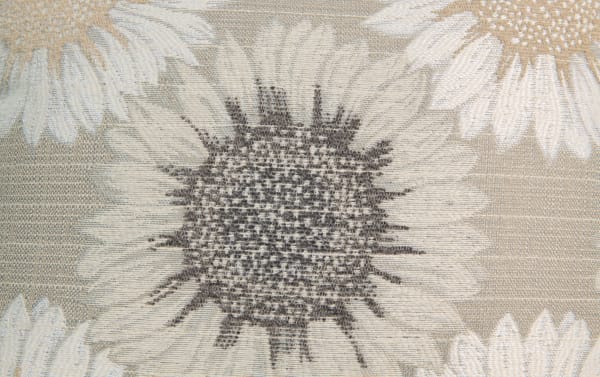 Close-up of a gray all-weather wicker sunflower pattern fabric with textured polyester weave, showcasing Cottage Chic Outdoor collection’s transitional style upholstery.