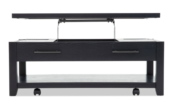 Modern black wooden coffee table with a lift-top feature revealing hidden storage, metal handles, lower shelf, and caster wheels for mobility.