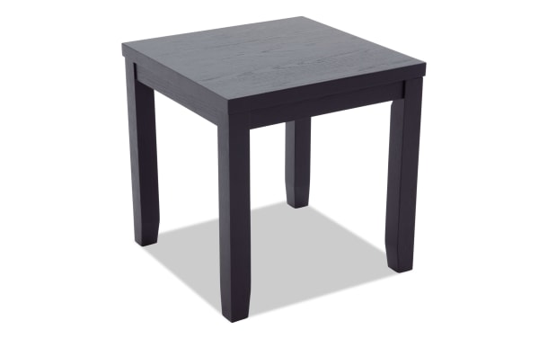 Square black wooden side table with four sturdy legs and a smooth flat top, suitable for living room or office use.