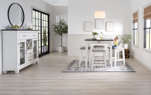 Montana 3 Piece White & Beige Upholstered Counter Height Dining Set with rubberwood, oak veneer distressed top, antique finish base, and cushioned backless stools.