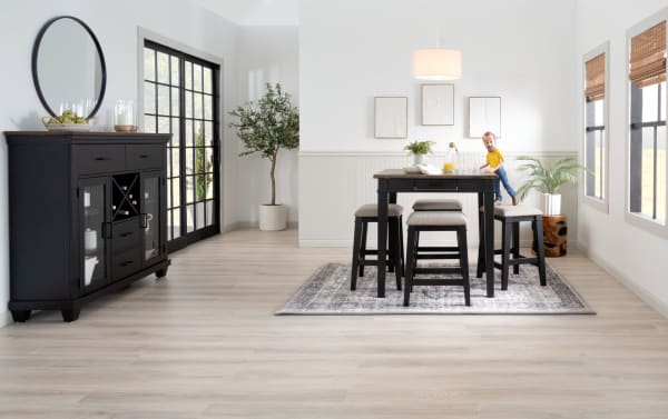 Montana 5 Piece Black & Beige Upholstered Counter Height Dining Set with rustic rubberwood, oak veneer distressed top, beige polyester fabric stools, and storage drawers.