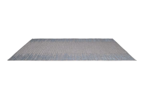 Harbor 5' x 7' blue abstract indoor/outdoor rug with contemporary style, machine-made polypropylene flat pile, textured thick and thin weft yarns.