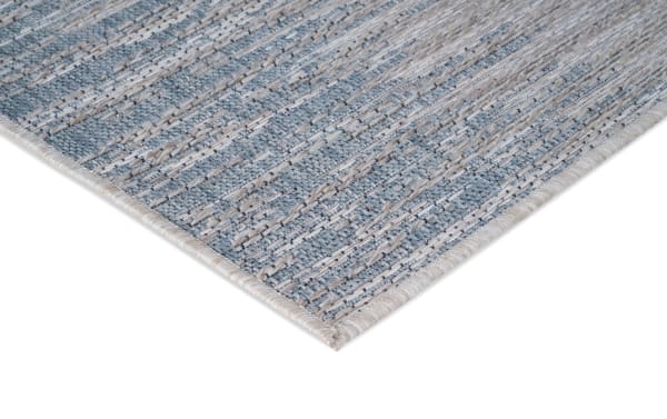 Contemporary Harbor 5' x 7' blue abstract indoor/outdoor rug with textured polypropylene flat pile and thick-thin weft yarns for dimension.
