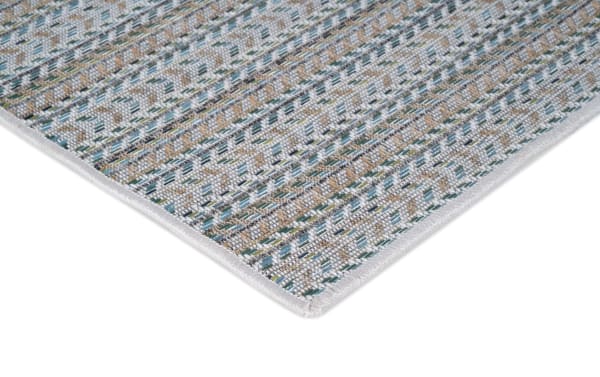 Contemporary Laguna 5' x 7' green striped indoor/outdoor rug with flat pile, machine-woven polypropylene for durable, high-traffic use.