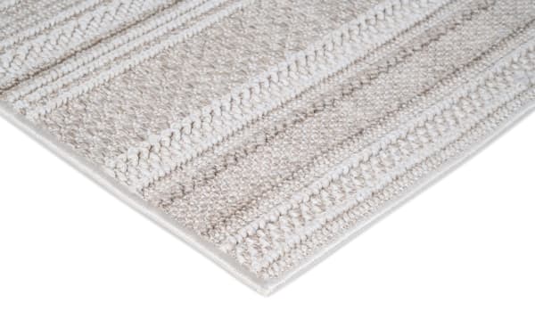 Beige striped Bradford 5' x 7' indoor/outdoor rug in durable machine-woven polypropylene with a contemporary natural fiber look.