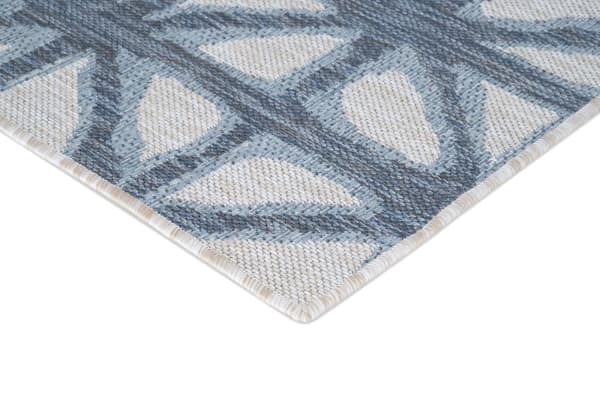 Contemporary Sol 8' x 10' Blue Geometric indoor/outdoor rug with durable machine-woven polypropylene, featuring a blue geometric pattern.