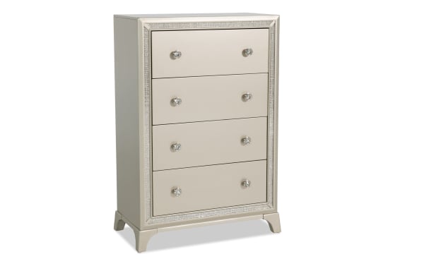 Celine Silver 4 Drawer Chest in glam style with silver lacquer wood, crystal-lined frame, and gem-handled spacious drawers from Celine Bedroom collection.