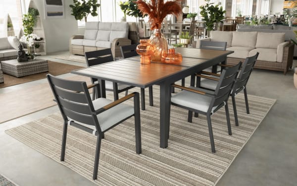 Laguna 7 Piece Gray Aluminum Outdoor Dining Set with powder-coated metal frame, polyester fabric cushions, and extendable leaf. Contemporary style.