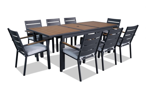 Laguna 9 Piece Gray Aluminum Outdoor Dining Set with extendable table, powder-coated metal frame, and gray polyester fabric cushions from Laguna Dining Outdoor collection.