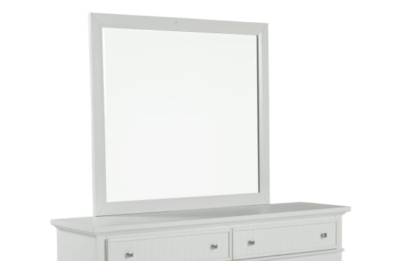White Spencer transitional dresser with square metal drawer pulls and a large matching framed mirror, made of hardwood solids, MDF, plywood, and veneers.