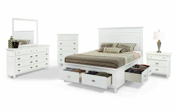 Spencer 5 Piece Full White Storage Platform Bedroom Set in transitional style, made of hardwood solids, MDF, plywood, poplar, and veneers. Features a white storage bed with four under-bed drawers, dresser with mirror, chest, and nightstand, all with multiple storage drawers and silver-tone handles for organized living.