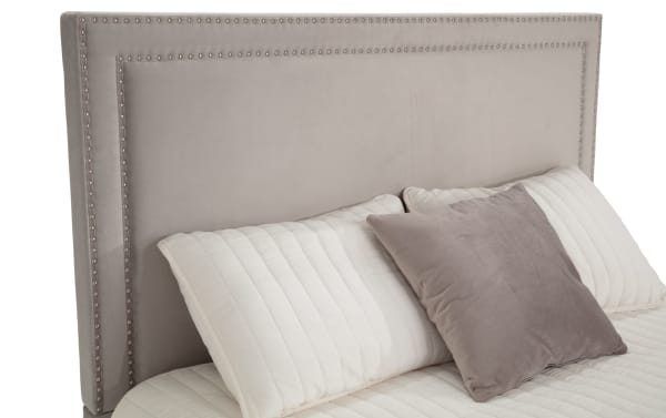 Tremont Twin Gray Upholstered Storage Panel Bed with gray polyester fabric, nailhead trim, and transitional style headboard in rubberwood and poplar solids.