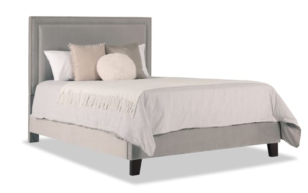 Tremont Full Gray Upholstered Panel Bed with gray polyester fabric, rubberwood frame, nailhead trim, and transitional style for elegant bedroom decor.