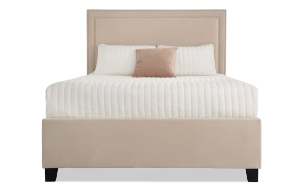 Tremont Queen Beige Upholstered Storage Panel Bed with nailhead trim, polyester fabric, rubberwood frame, and transitional style.