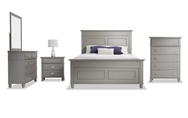 Spencer 5 Piece Queen Gray Panel Bedroom Set in transitional style, made of hardwood solids, MDF, plywood, poplar, and veneers. Includes queen bed, dresser with mirror, chest, and nightstand, all with multiple storage drawers and a gray finish.